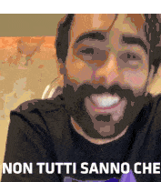 a man with a beard is smiling with the words non tutti sanno che written on the bottom