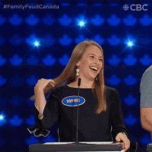Laughing Family Feud Canada GIF - Laughing Family Feud Canada Flip Hair GIFs