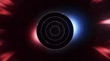a group of people are standing in a circle in a dark room with a planet in the background .
