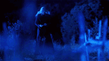 a blue background with a sword that says death note
