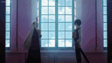 a man and a woman standing next to each other in front of a window with the word anime on the bottom