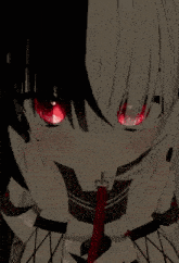 a girl with red eyes is making a face with her hands