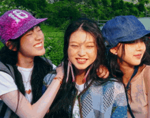 a girl wearing a hat with the number 18 on it