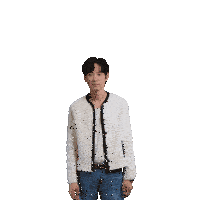 a man in a white jacket and jeans is raising his arms
