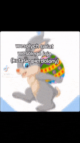 a cartoon rabbit carrying a colorful easter egg on its back