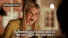 a woman is laughing and saying `` sometimes our battles pick us . we can 't quit .