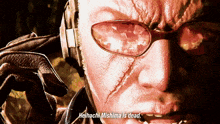 a close up of a man 's face with the words heihachi mishima is dead below it