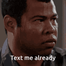 a man with sweat on his face and the words text me already below him