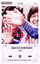 a screenshot of a video playing on a cell phone titled ajab si ( om & shanti )