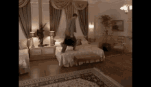 Dumb And Dumber Hotel Bed GIF - Dumb And Dumber Hotel Bed GIFs