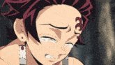 a close up of a cartoon character 's face with tears coming out of his eyes