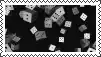 a black and white photo of dice flying in the air .