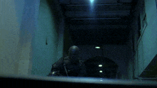 a man wearing a mask and holding a gun