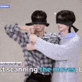 two blindfolded men standing next to each other with the words understandings scanning the moves below them