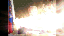 a blurred image of a person with the word exxon on the bottom