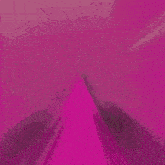 a pink square with a white circle in the middle