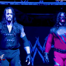 The Undertaker Kane GIF - The Undertaker Kane Entrance GIFs