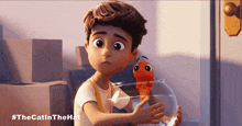 a cartoon boy is holding a fish in a bowl with #thecatinthehat written on the bottom