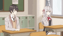 a boy and a girl sit at desks in a classroom with a sign on the wall that says ' a ' on it