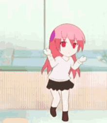 a little girl with pink hair and red eyes is dancing in a room .