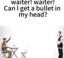 a waiter is standing next to a man sitting at a table with a laptop .