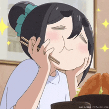 a cartoon of a girl eating food with chopsticks and a caption that says ' a / ' on it