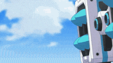 a white and blue object with a blue sky in the background