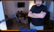 a man with his arms crossed in front of a screen that says perpucho
