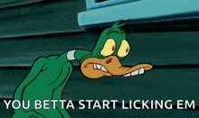 a cartoon duck is standing next to a window with the words `` you betta start licking em '' .