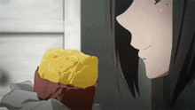 a girl with long black hair is looking at a piece of bread