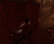 a person in a video game is standing in front of a red container that says ' container ' on it