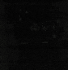 a black background with a few white stars on it .