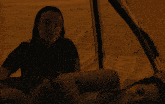 two women are laying in a tent and one of them is saying " well good night "
