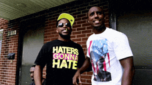 a man wearing a haters gonna hate shirt