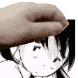 a hand is putting a hat on a girl 's head in a black and white image .