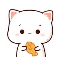 a white cat is holding a fish in its mouth .