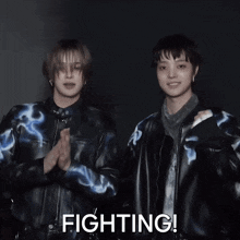 two men standing next to each other with the word fighting on the bottom right