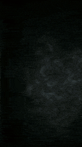 a blue lightning bolt is coming out of a dark sky