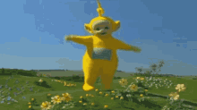 a teletubbies character is standing in a field of flowers
