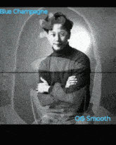 a black and white photo of a man with the words blue champagne on the bottom