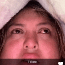 a close up of a woman 's face with the words " i done " written on the bottom