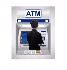 a man is using an atm machine with his back to the camera