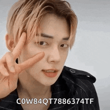 a close up of a person giving a peace sign with cow84qt7886374tf written below them