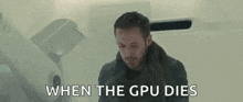a man is sitting in a room with the words `` when the gpu dies '' .