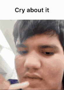 a close up of a man 's face with the words cry about it above him .