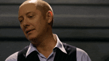 a bald man with the words may i see it in red