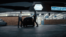 a store front with a sign that says open 7 am to midnight