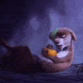 a cartoon dog with a bandage on its head is holding an orange