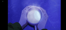 a person is holding a cup of liquid in their hands