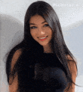 a woman with long black hair is smiling with pixverse.ai in the upper left corner